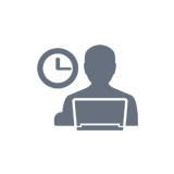 instructor with laptop and clock